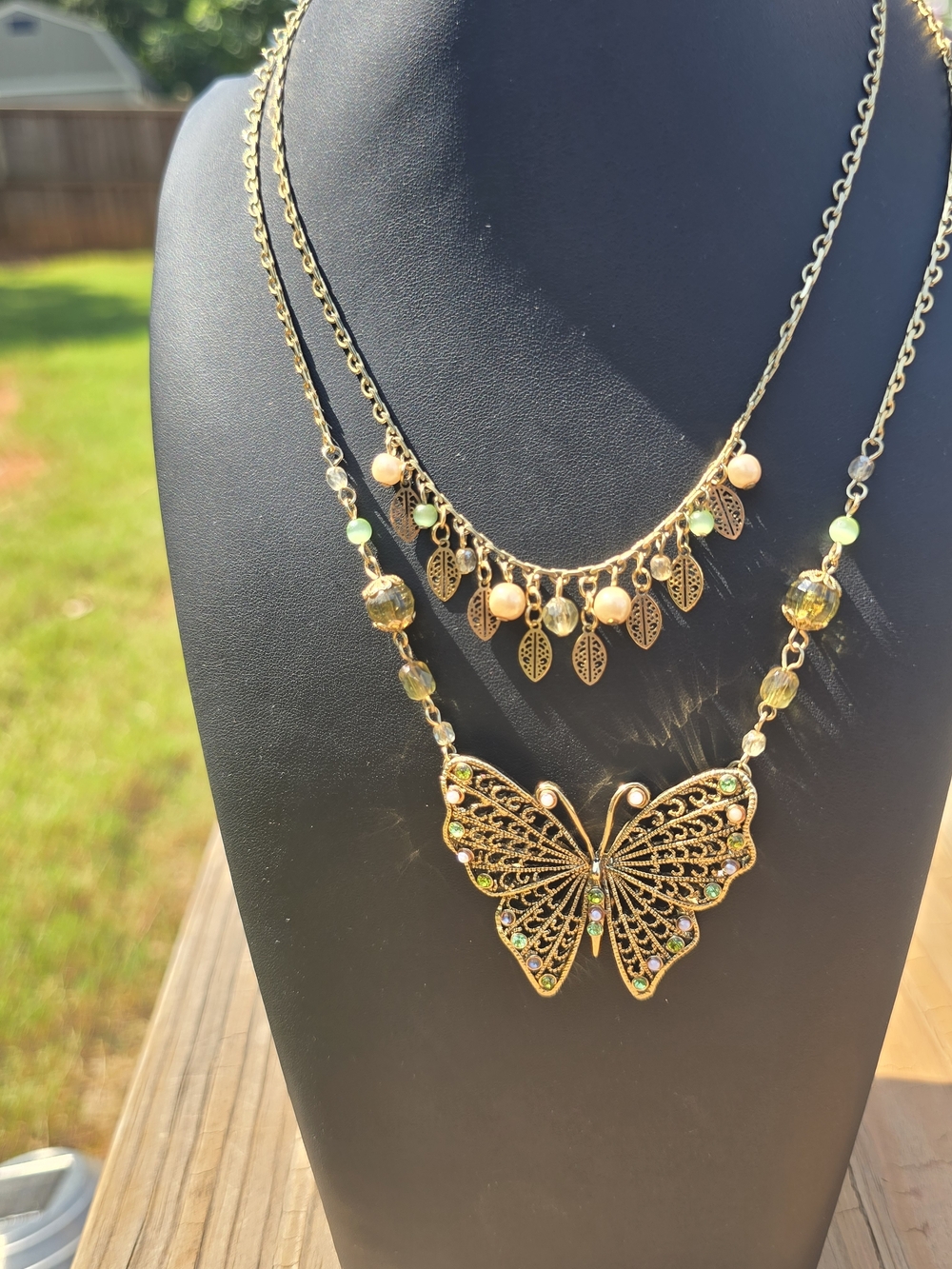 Gold Butterfly Layered Necklace with Leaf Charm Accents